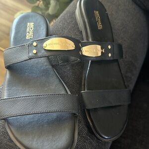 Michael Kors Black Slide Sandals with Gold Plaque Accents
